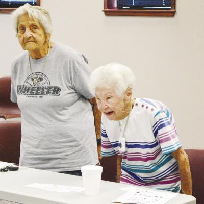 Carol Balzer, left, and Betty Madison do chair squats during their low-impact exercise class at Clinton Regional Hospital. CDN | Christian Jacobsen Carol Balzer, left, and Betty Madison do chair squats during their low-impact exercise class at Clinton Regional Hospital. CDN | Christian Jacobsen