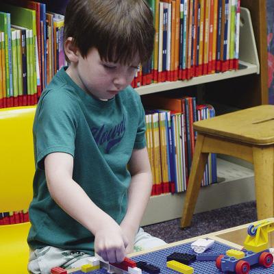 Jimi Haag is building his dream house out of Legos recently at the Clinton Public Library. CDN | Christian Jacobsen