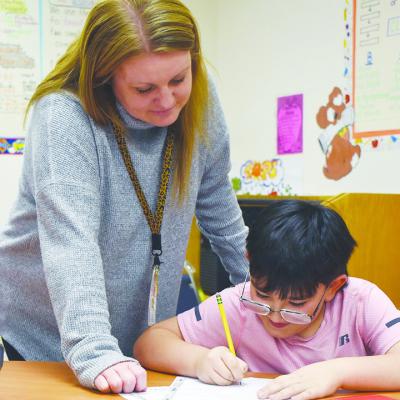 Eastide Academy kids, volunteers display spirit of Clinton