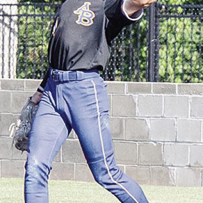 Rylan Moore throws the ball to one of his teammates after getting the out at first during A-B’s game against Wright City Thursday at Shawnee High School. CDN | Sam Goodwyn