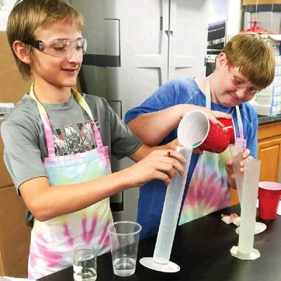 Science students conduct experiment
