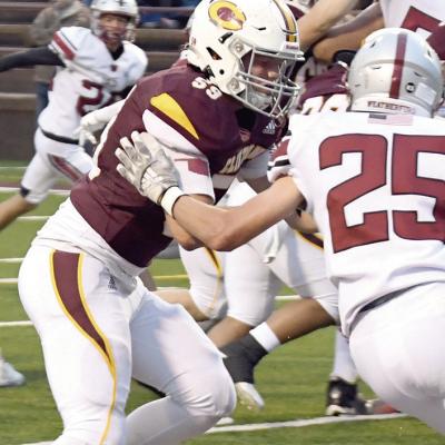 Riley James fires out and makes a block during the Custer County Conflict. CDN | John Kinsey ‘It is a privilege to grow up in Clinton’