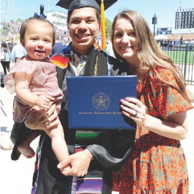 Andres Flores dons his cap and gown with his wife Trinity and baby Camila Jo Flores at his SWOSU graduation. CDN | Courtesy photo Flores accomplishes dreams with hard work