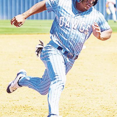 SWOSU’s Gage Gaunt rounds third in the Bulldogs’ game against East Central University. CDN | Courtesy photo