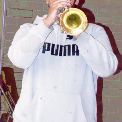 Playing trumpet