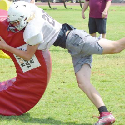 Clinton opens spring practice with energy jolt