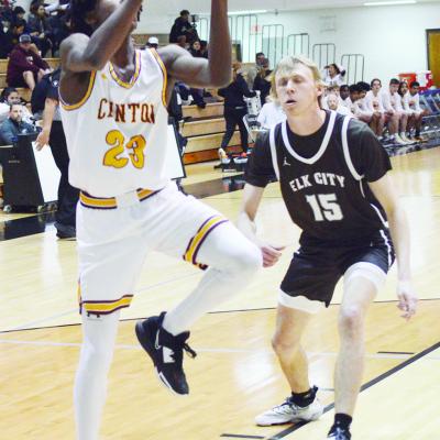 Clinton’s Atticus Thompson races past the Elk City defender to go in for a bucket. CDN | Emily Stephens CHS ends season with regional losses