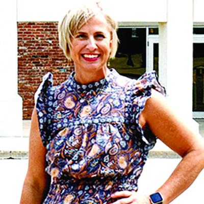 Traci Heerwald, chair of the Clinton Chamber of Commerce board of directors, stands in front of the Frisco Center where the annual chamber banquet will be held. Chamber event to honor citizens
