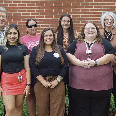 Front left, Robyn Randol, Marla Pankratz, Astrid Olguin, Kaylah Anderson, Sarah Dean, Devon Mitchell; back, Southwestern Oklahoma State University Dean of Education and Behavioral Sciences Ed Klein, Oklahoma CareerTech Director of Workforce Training Max M