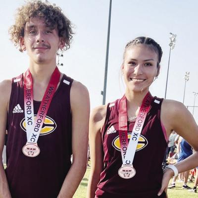 Two Red Tornado runners race to state