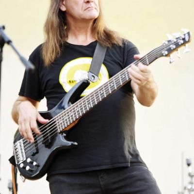 Brent Saulsbury plays bass guitar for Kyle Dillingham at the final Levitt Amp Concert at McLain Rogers Amphitheater. CDN | Caleb Blanchard Different kind of six-string