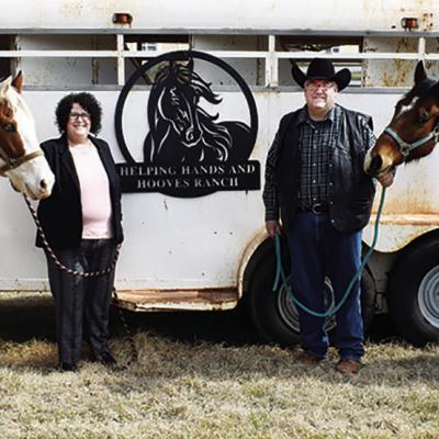 Tamra, left, and Brad Haskell stand with their horses Ozark and Alpha at Helping Hands and Hooves Ranch. CDN | Caleb Blanchard Couple looks to serve others through horses, ministry