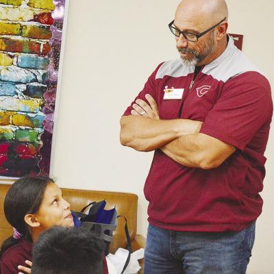 Paris Nava, left, and Clinton Public Schools Supt. Nathan Meget talk about being hardworking, during the “Character Champions” lunch at Washington Elementary School. CDN | Micah Ashcraft Paris Nava, left, and Clinton Public Schools Supt. Nathan Meget talk about being hardworking, during the “Character Champions” lunch at Washington Elementary School. CDN | Micah Ashcraft