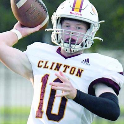 Cooper Sulley looks down field and throws the football. CDN | John Kinsey Reds lose to McGuinness