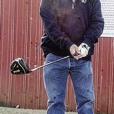 Ray Martin aims where he wants to send the ball before he tees off Thursday at Riverside Golf Course. CDN | Sam Goodwyn