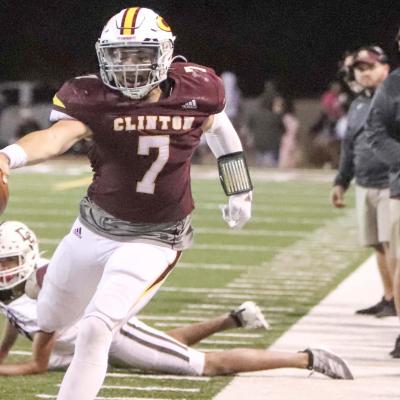 Caden Powell rushes for a first down versus Elk City while head coach John Higbee and assistant Jacob Lee watch from the sideline. Powell accounted for 253 yards and four touchdowns in the 34-0 win. CDN | Adam Ewing Red Tornadoes blank Elk City