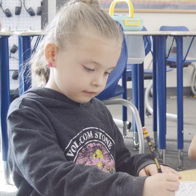 Nance Elementary School students work on writing skills in class