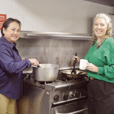From left, Clinton Rotary Club President Natalie Simpson, and fellow Rotarians Hoi Geswender, Carolyn Heerwald, and Conner Kirk bring the spice to the Frisco Center kitchen ahead of the Rotary Club Chili Day and Silent Auction tomorrow. CDN | Micah Ashcra