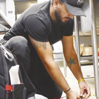 Maintenance man Joshua Salinas prepares to hook up new garbage disposals in the Custer County Jail’s kitchen at 300 N. 7th Ave., Arapaho. CDN | Caleb Blanchard Sheriff Day talks jail problems