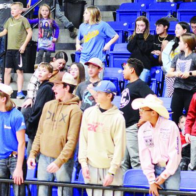 Arapaho-Butler High School basketball fans cheer on the teams during a recent home game. CDN | Staff photo Cheering on the A-B Indians