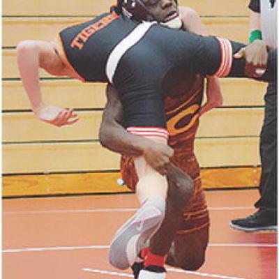 CHS wrestling brings home conference title