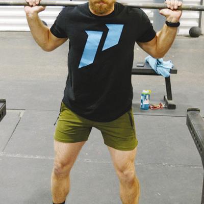 Jaron Keller finishes up his third set of weightlifting at Acme Park. CDN | Michael Maresh