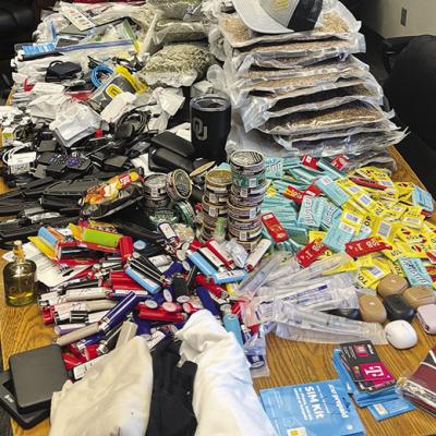 A table full of contraband seized by the Oklahoma Department of Corrections in 2025. CDN | Courtesy photo