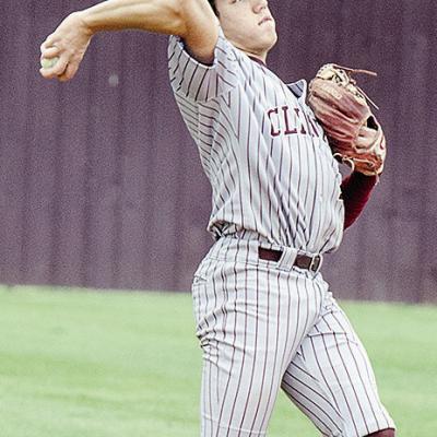 Clinton’s Easten Powell tosses the ball to the pitcher during the Reds’ home game Friday against the Kingfisher Yellowjackets. CDN | Sam Goodwyn