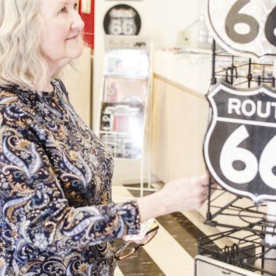 Terri O’Bryant of Oklahoma City checks out the souvenirs at the Oklahoma Route 66 Museum. CDN | Sam Goodwyn
