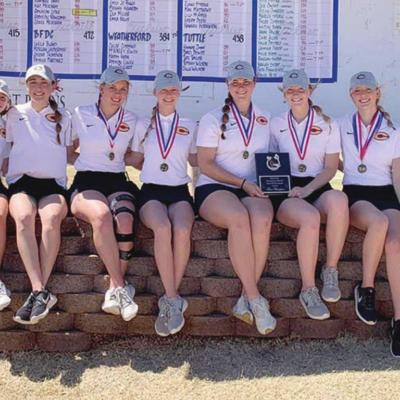 Clinton girls’ golf took first at the Elk City Tournament Tuesday afternoon. Pictured, from left: Assistant coach Brent Caldwell, Rylee Cummins, Acelyn Cisneros, Grace Meacham, Addison Newcomb, Kat Meacham, Kambree Davis, Addyson Littke and head coach M Lady Reds take 1st at Elk City Tournament