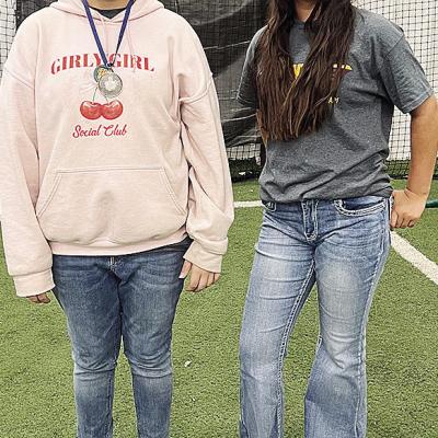 Sophia Williams, left, and Sawyer Acosta smile after competing at the Area Special Olympics Unified Bocce Ball Tournament at Clinton High School. CDN |Courtesy Photo