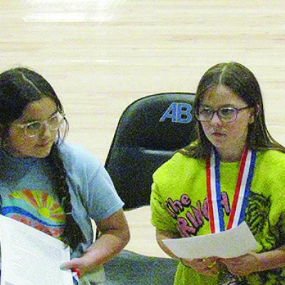 Arapaho-Butler Schools recently hosted its fifth- and sixth-grade D.A.R.E. graduation. Shown are the winners of the essay portion of the training as they read them to the rest of the class. From left are sixth-graders Emory Richardson, and Kori Jackson, a