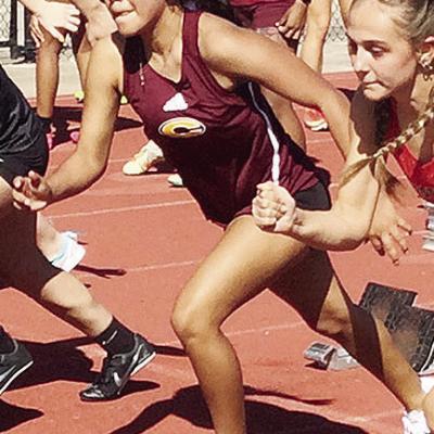 Clinton’s Savannah Flores takes off in the 100-meter race during the season-opening meet at Edmond North. CDN | Courtesy photo