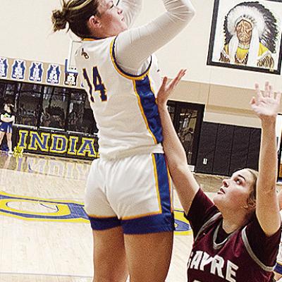 Arapaho-Butler’s Peyton Lambeth, left, shoots over the Sayre defender during the Lady Indians’ win over the Lady Eagles Thursday in the first round of the Western Equipment Classic. CDN | Sam Goodwyn