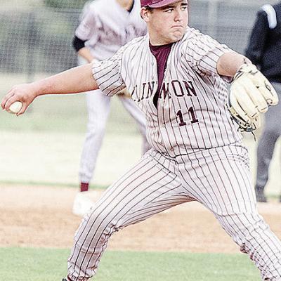 Clinton’s Eli Anderson pitches during the Reds’ home game against the Kingfisher Yellowjackets. CDN | Sam Goodwyn
