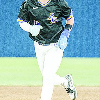 Arapaho-Butler’s Jack Goldsberry sprints to third base during the Indians’ win Thursday over Fletcher at home. CDN | Sam Goodwyn