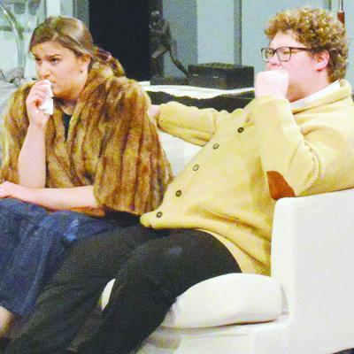 Actors Amelia Hardaway and Boone Hardaway listen closely to a reveal in “Dial M for Murder” at Southwest Playhouse. The play will continue this weekend. CDN | Christian Jacobsen