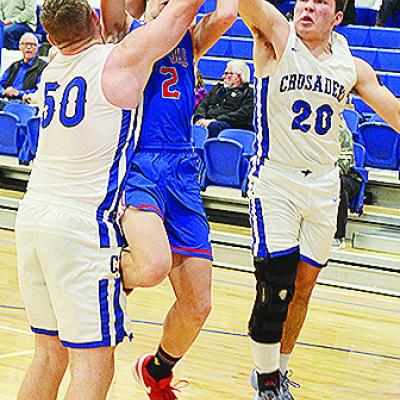 No. 50 Cruze Bittle and No. 20 Zach Zyback come together to help stop the Bray-Doyle player during CBA’s first-round win over the Donkeys. CDN | Sam Goodwyn