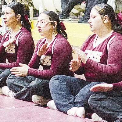 Cheering on the wrestlers