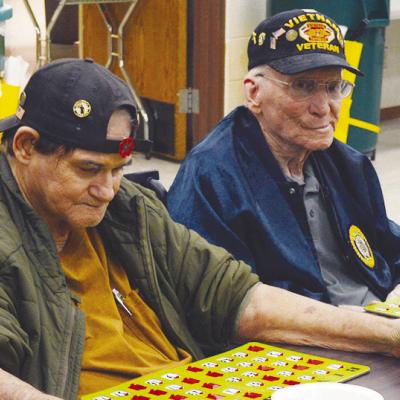 George G. Goret, left, and David Mitchell are playing bingo at the Clinton Veterans Center. Mitchell completed a bingo on the immediate next number called. CDN | Christian Jacobsen George G. Goret, left, and David Mitchell are playing bingo at the Clinton Veterans Center. Mitchell completed a bingo on the immediate next number called. CDN | Christian Jacobsen