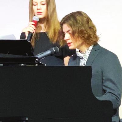 Kalyssa Staggs, left, and her brother Hunter Staggs prepare for the fifth annual Christmas serenade at the Southwest Playhouse. SWPH to hold Christmas Serenade