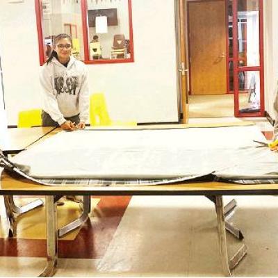 CDN | Courtesy Photo Students roll up their sleeves