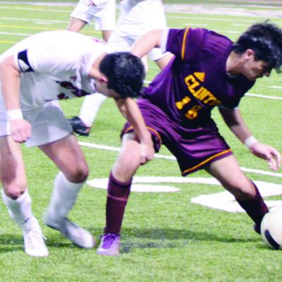 Clinton’s No. 18 Anthony Soto, right, fights for the ball with a Fort Gibson defender during a home game earlier in the year. CDN | Emily Stephens Senior proud of team’s championship legacy