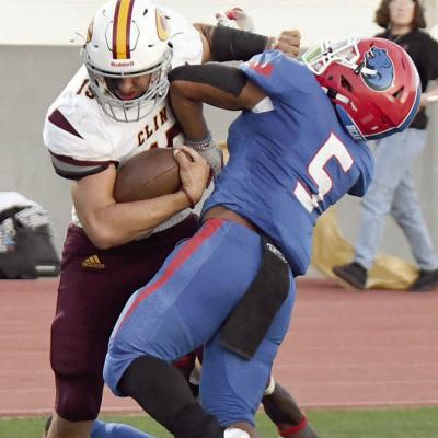 Reds win first district game