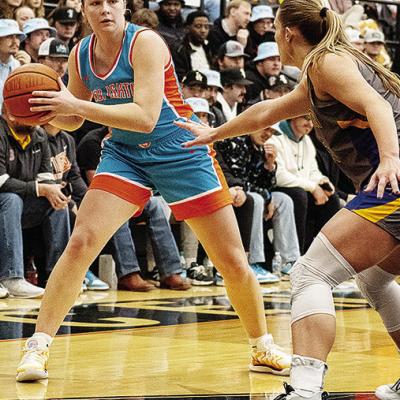 Former Arapaho-Butler Lady Indian Katie Edelen looks for an open teammate during an East Central game this season. CDN | Courtesy Photo