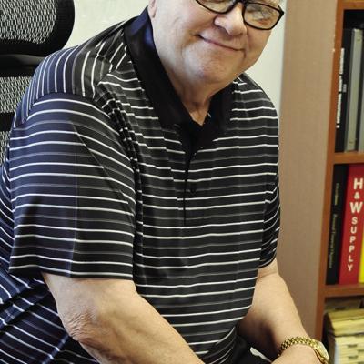 L.R. Sights in his office at Southwest Distributing at 10018 U.S. Hwy 183. CDN | Caleb Blanchard Sights still on the job, even in retirement