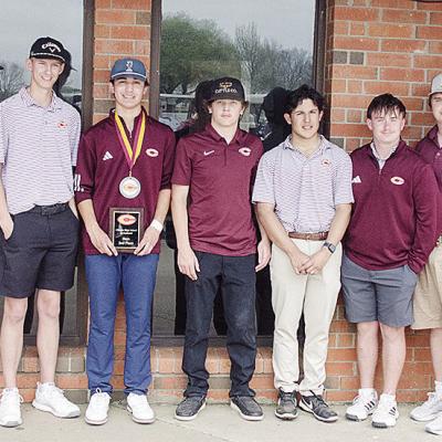 The Clinton boys’ golf team smiles after finishing the high school tournament Wednesday at Riverside Golf Course. Pictured, from left, are Coach Brent Caldwell, Conner Meget, Caber Johnson, Landyn Kunsman, Scout Acosta, Sy Foster, Sutton Hernandez, Rayd