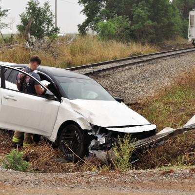 One woman and two children were believed to be the occupants of this vehicle that collided with a train just before 8 a.m. Wednesday morning on 1090 Road, just off U.S. Highway 183 in northern Washita County. They were allegedly taken by private vehicle t