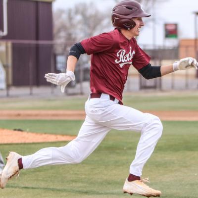 Kyler Carlisle beats a throw to first during Clinton’s 20-0 win over Anadarko Monday evening. In two games, Carlisle went 4-for-4 with three RBIs and four runs scored CDN | Adam Ewing Reds score 45 in twinbill