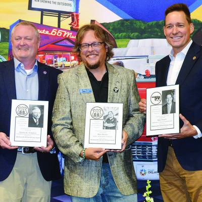 Saturday at the Frisco Center the Oklahoma Route 66 Association added to its Hall of Fame, from left, Charles Harland Tompkins as accepted by David Black, vice mayor for El Reno; Rhys Martin, president of the Oklahoma Route 66 Association; and Lt. Gov. Ma
